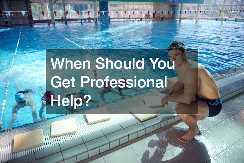a swimming instructor and his students